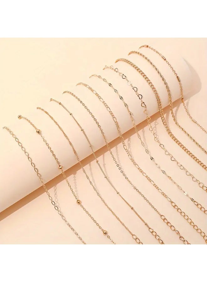 Goolsky A Set of 11 Minimalist And Versatile Thin Chain Bracelets Featuring Twisted Designs And Heart Motifs. - Image 4