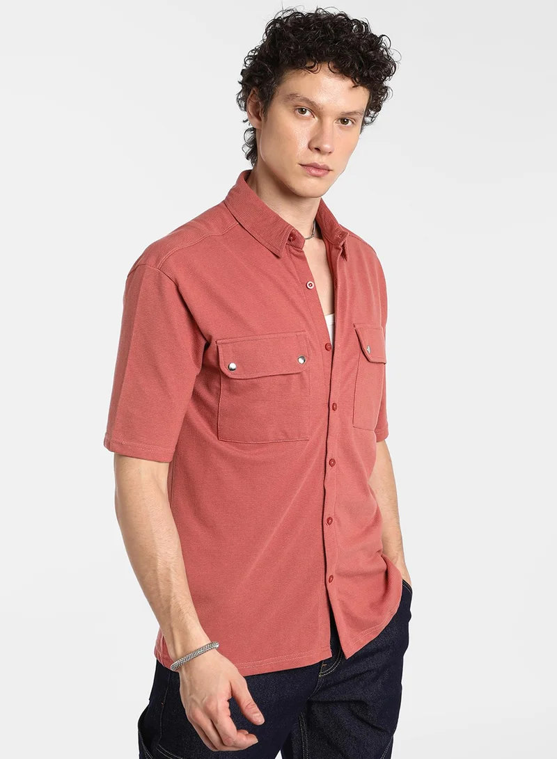 Campus Sutra Men's Terracotta Orange Utility Knit Shirt For Casual Wear | Spread Collar | Short Sleeve | Button Closure | Shirt Crafted With Comfort Fit For Everyday Wear