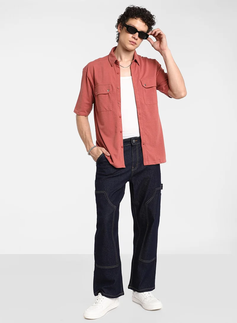 Campus Sutra Men's Terracotta Orange Utility Knit Shirt For Casual Wear | Spread Collar | Short Sleeve | Button Closure | Shirt Crafted With Comfort Fit For Everyday Wear