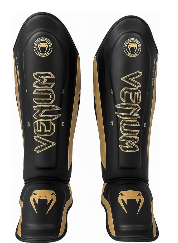 فينوم واقيات ساق احترافية للكيك بوكسينج والمواي تاي – حماية عالية الجودة للتمارين القتالية وفنون القتال المختلطة – تصميم متين وثابت (اسود/ذهبي) - Image 1