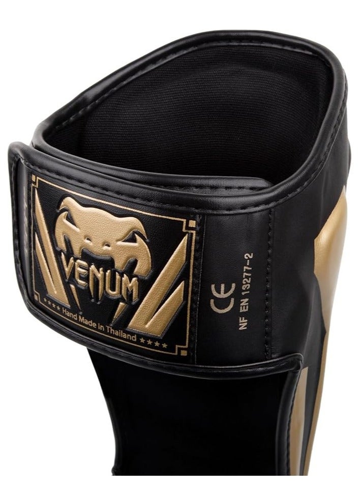 فينوم واقيات ساق احترافية للكيك بوكسينج والمواي تاي – حماية عالية الجودة للتمارين القتالية وفنون القتال المختلطة – تصميم متين وثابت (اسود/ذهبي) - Image 3