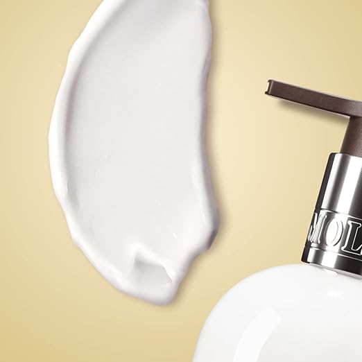 MOLTON BROWN لوشن الجسم ميسمرايزينغ عود أكورد جولد من مولتون براون 300 مل - Image 4