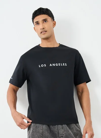 Styli Styli Slogan Print Crew Neck Oversized T-Shirt