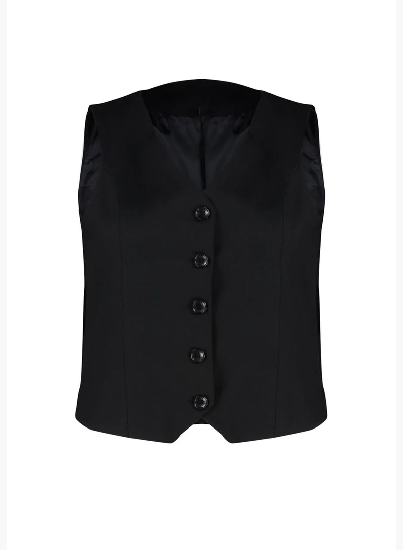 ترينديول سترة منسوجة بأزرار سوداء TBBSS24BH00003