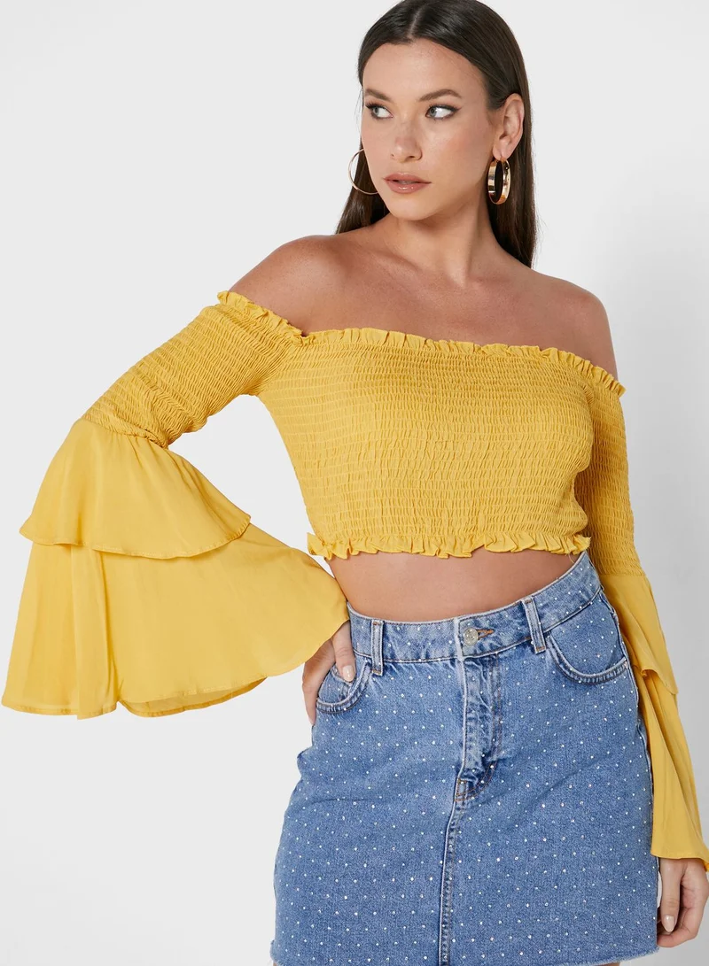 saint genies Bardot Shirred Crop Top