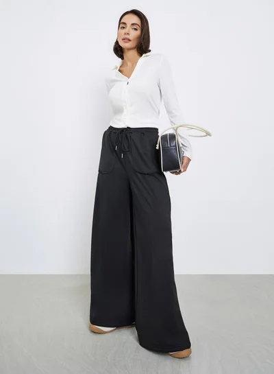 Styli Women Black Plain Wide Leg Joggers with Drawstring Waist