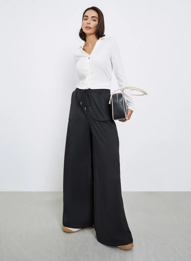 Styli Women Black Plain Wide Leg Joggers with Drawstring Waist