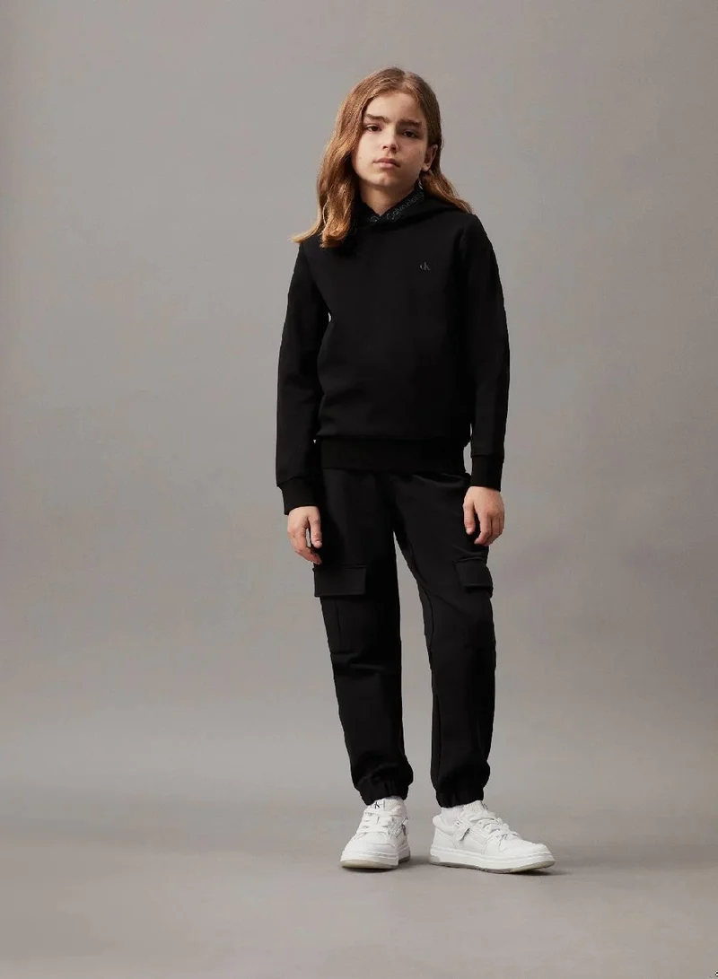 Calvin Klein Jeans  Relaxed Terry Cargo Joggers for Men | Best Price UAE