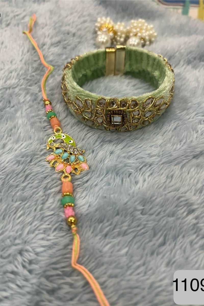 Traditional Raksha Bandhan Gift Set with Decorative Peacock Rakhi and Velvet Bangle, Multicolour