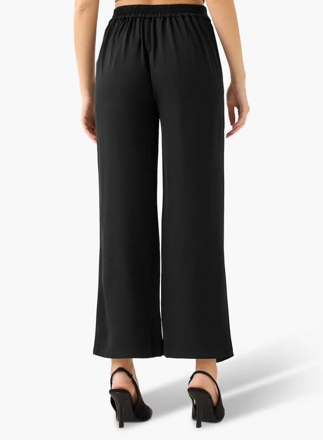 Iconic BLACK Iconic Straight Fit Button Waist Wrap Pants for Women | Best Price UAE