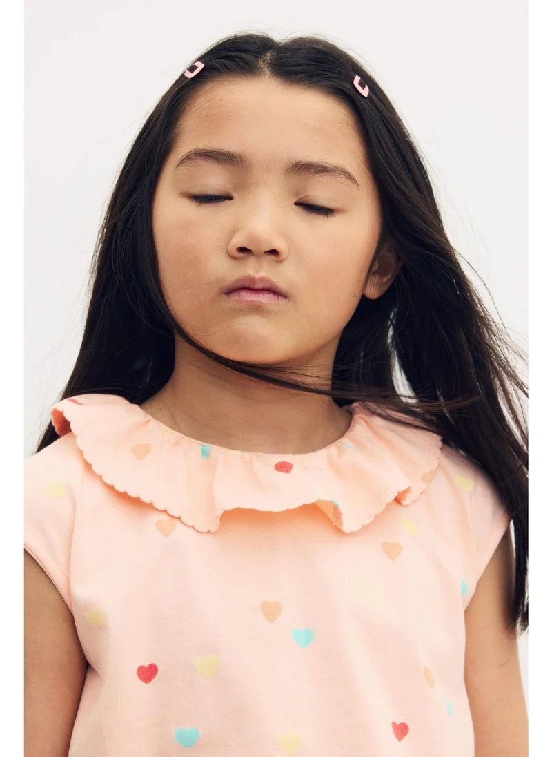 اتش اند ام بلوزة مطبوعة