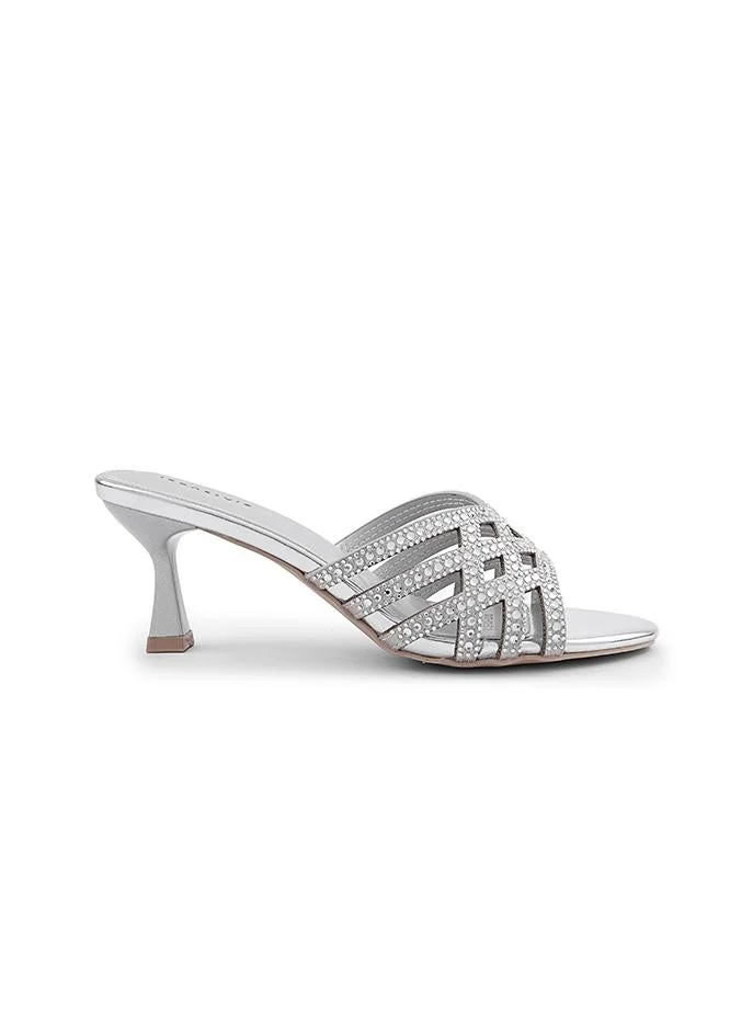 IconStyle Elegant heel slipper with secure ankle strap.