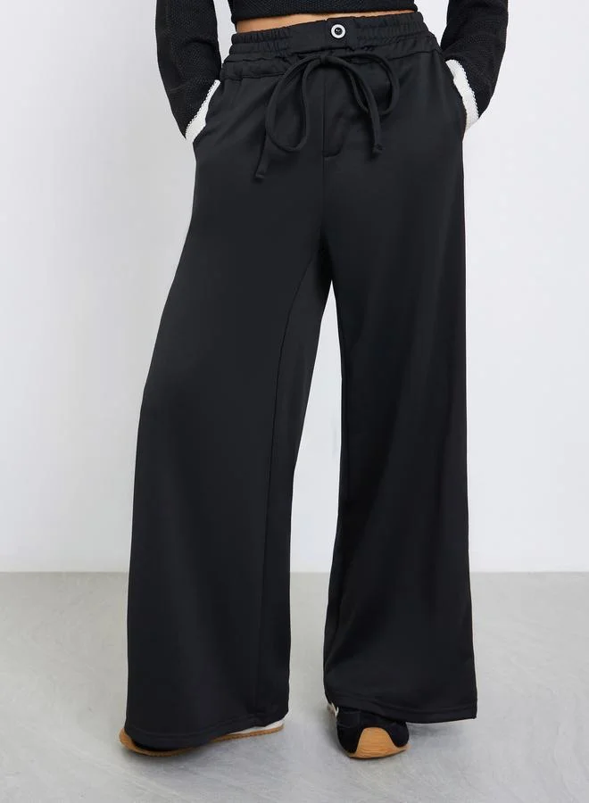 Styli Black Wide Leg Joggers with Tie Detail