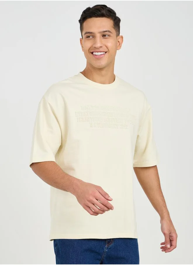 Styli Styli Oversized Chest Tonal Embossed Print Terry T-Shirt