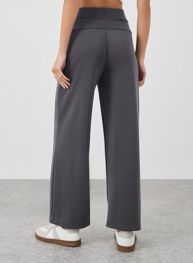 ستايلي بنطلون جوجر ستايلي بخصر عريض وتفاصيل ثنيات - Image 4