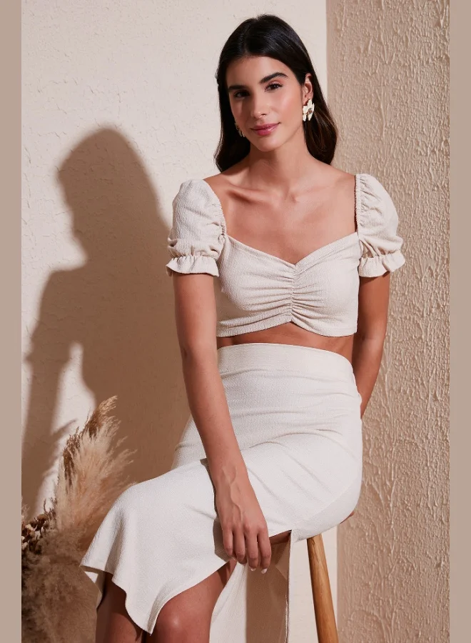 ليلا بلوزة نسائية قصيرة بياقة قلب وخصر مجسم