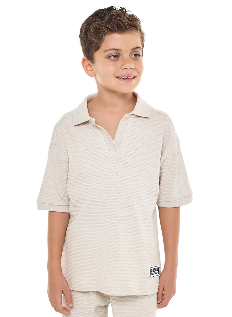 victor and jane Oversized - Boys' Jacquard 2-Piece Set - Polo T-Shirt with Badge Detail and matching Shorts with Pockets,