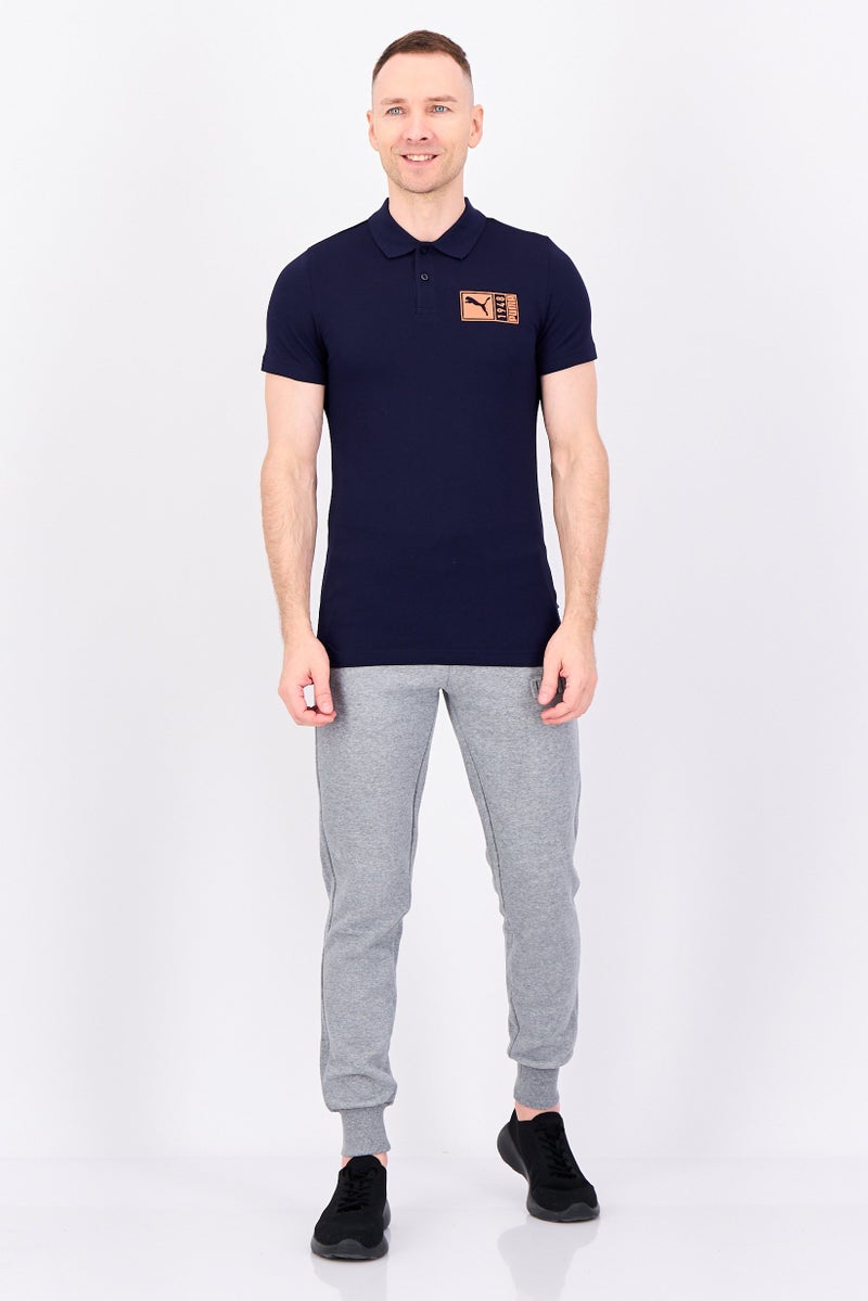 PUMA قميص بولو قصير الأكمام للرجال، رياضي، خارجي، لون كحلي - Image 4