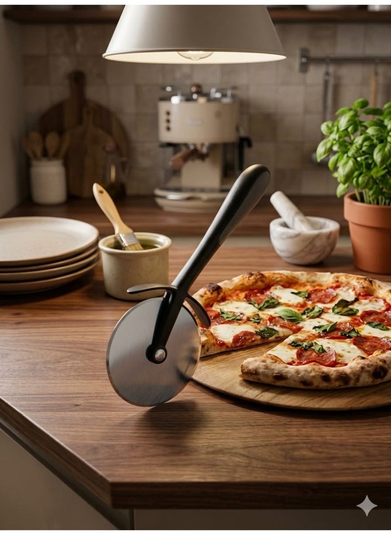 This pizza cutter features a stainless steel wheel design, is sharp and durable, and has a comfortable grip – perfect for cutting pizza, pastries, and dough – and is dishwasher safe. - Image 2