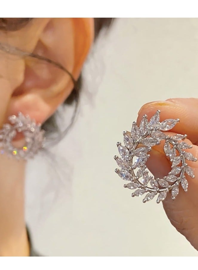Rwnq Luxury Laurel Wreath Design Platinum Earrings, adorned with sparkling zircon stones and featuring a 925 sterling silver post – an elegant and eye-catching hoop earring, perfect for soirées and special occasions. An ideal gift for women. #Accessories #Jewelry #Women'sAccessories  - Image 1