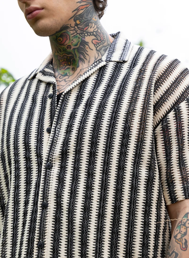 Campus Sutra Campus Sutra Men Candy-Striped Crochet Oversized Shirt | Cuban Collar Short Regular Sleeves | Button Closure Straight Hem | Stripes Crochet | Woven Fabric For Casual & Vacation Wear | Black & White