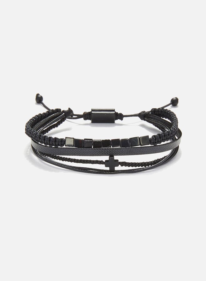 CHRYSOSTOMOS Handmade Adjustable Beaded Multi-Line Bracelet with Black Squared Glossy Hematite, Braided Macrame, Black Cord and Black Hematite Cross - Image 1