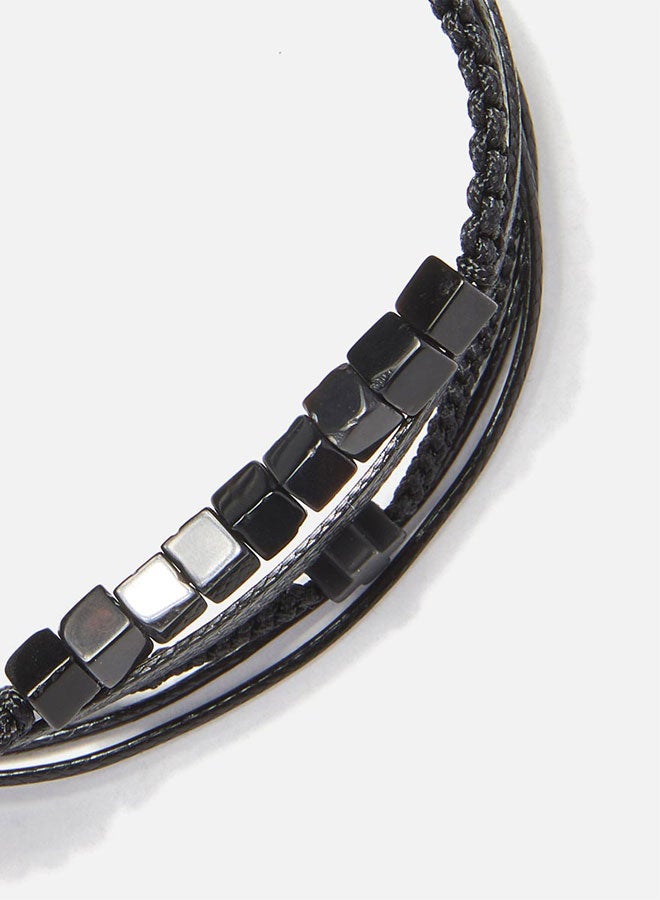 CHRYSOSTOMOS Handmade Adjustable Beaded Multi-Line Bracelet with Black Squared Glossy Hematite, Braided Macrame, Black Cord and Black Hematite Cross - Image 2
