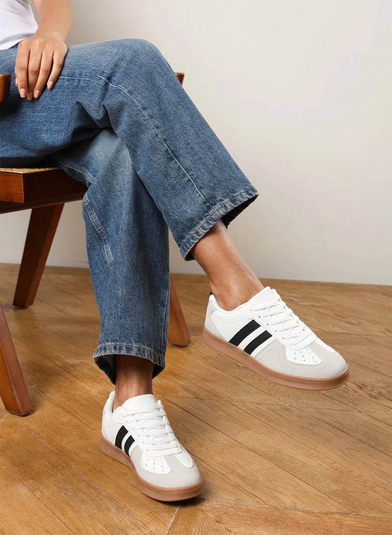 Where's That From  'Xia' Classic retro lace up trainer with stripes for Women | Best Price UAE