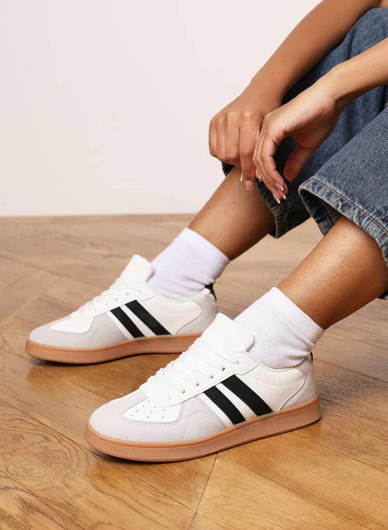Where's That From 'Xia' Classic retro lace up trainer with stripes