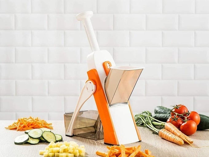 HOME MULTIFUNCTIONAL KITCHEN VEGETABLE CUTTER MANDOLINE CHOPPER WITH STAINLESS STEEL BLADES VEGETABLE SHREDDER GRINDER SLICER AND SALAD MAKER MACHINE