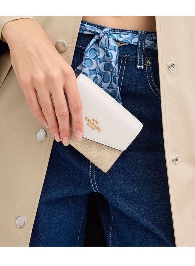 coachoutlet Women's short wallet, multi-card slot wallet, classic white with classic patterned design, easy to carry - Image 2