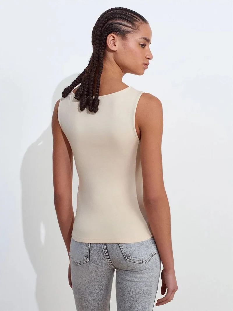 ديلفين DILVIN Sleeveless Boat Neck Jersey Blouse
