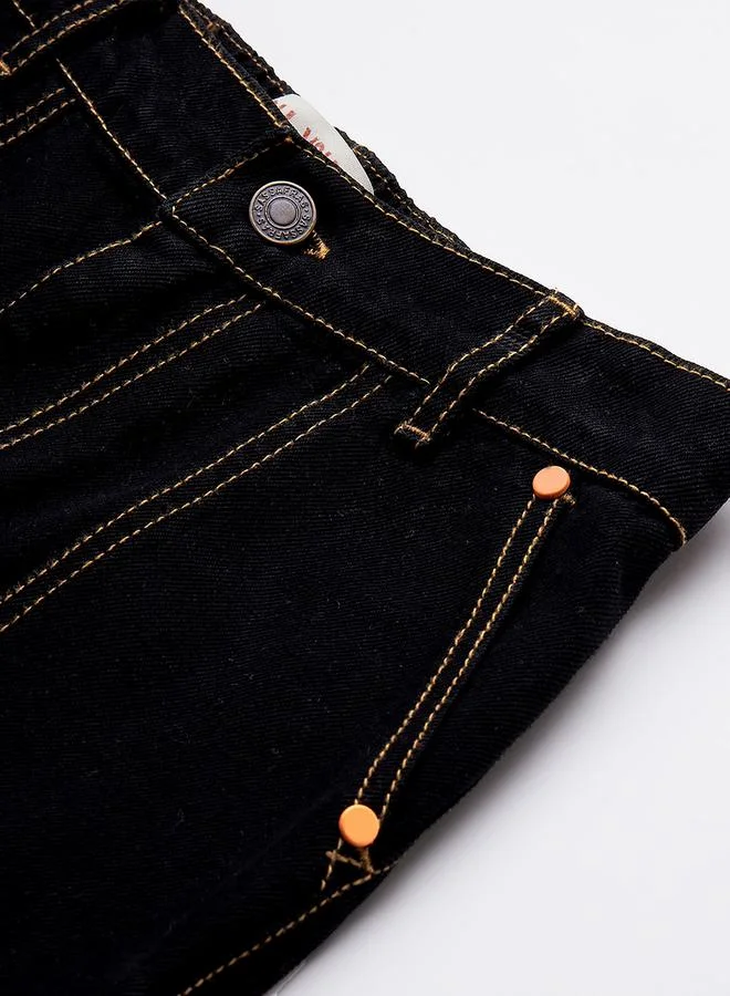 نو- ڤو Contrast Stitch Detail Knee Slit Denim Joggers by Styli
