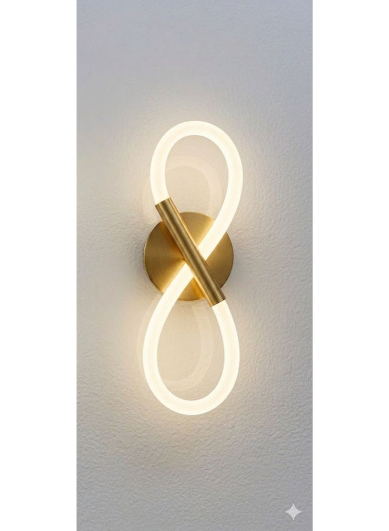 Modern wall sconce with an infinity symbol design - gold - Image 1
