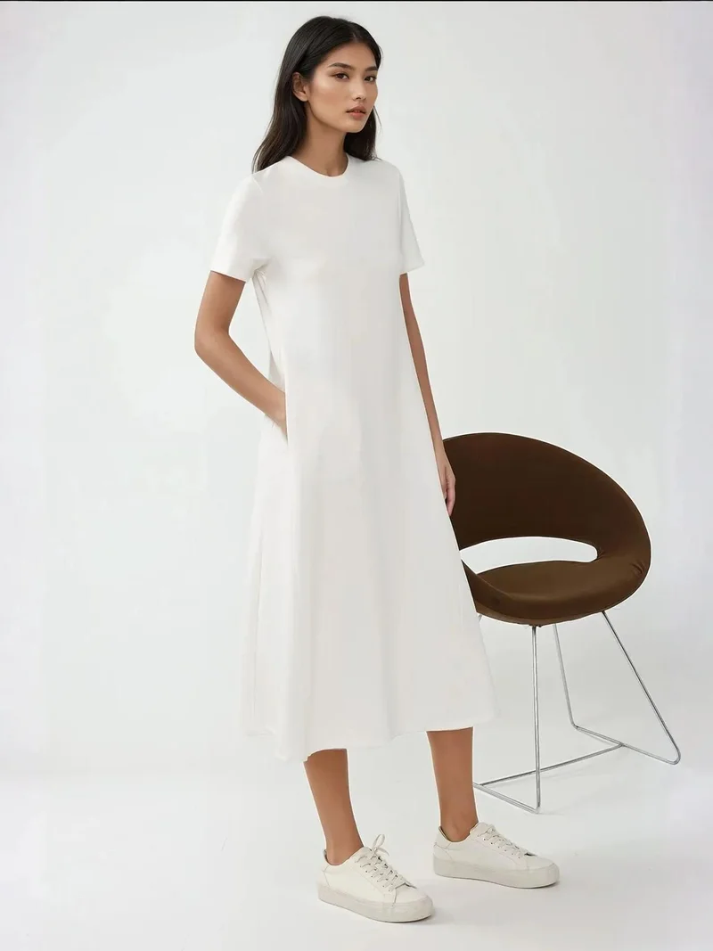 زوبعة فستان ميدي أساسي بأكمام قصيرة ورقبة دائرية من مجموعة بوزم