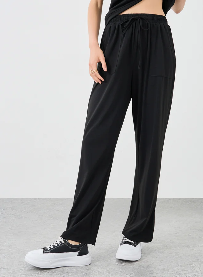 Styli Styli Solid Boxy Fit T-Shirt and Pants Co-Ords