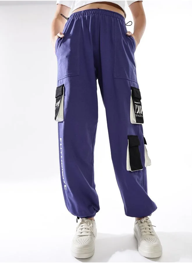 هوبرهولمي Women Track Pants in Multicolor featuring Jogger fit with a printed pattern, no sleeves, regular length, secured with elasicated + drawstring closure, crafted from terry – designed to make a statement wherever you go.