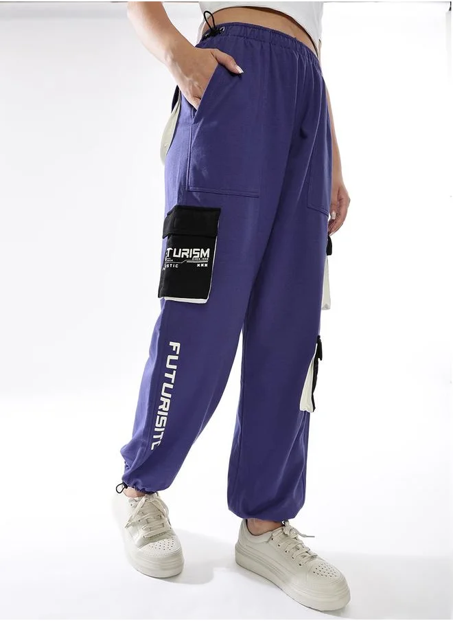 هوبرهولمي Women Track Pants in Multicolor featuring Jogger fit with a printed pattern, no sleeves, regular length, secured with elasicated + drawstring closure, crafted from terry – designed to make a statement wherever you go.