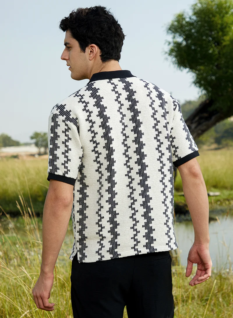 Campus Sutra Campus Sutra Men's Onyx Black & Cream White Indie-Block Polo T-Shirt For Casual Wear | Polo Neck | Short Cuffed Sleeves | Half-Button Closure | T-Shirt Crafted With Comfort Fit For Everyday Wear