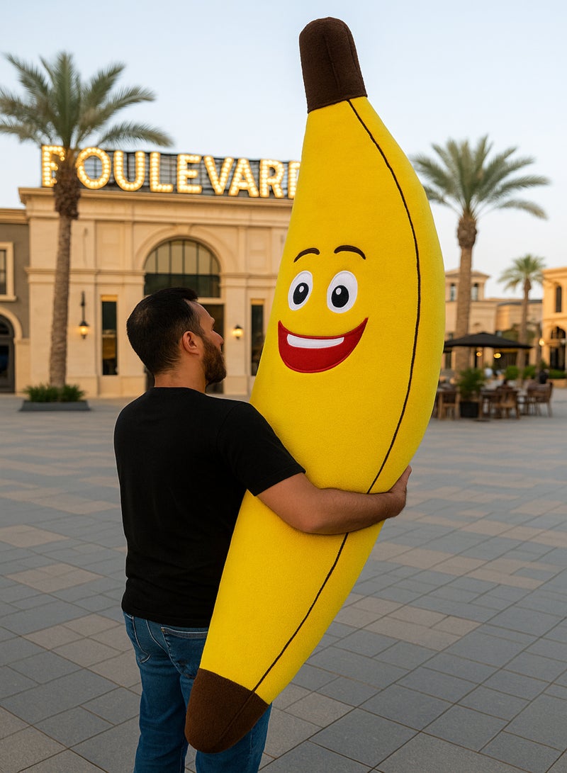 XiuWoo Giant Banana Pillow 180 cm – Soft Fiber-Filled Banana Plush with Funny Emoji Face, Inspired by Riyadh Boulevard Décor, Suitable for Kids’ Rooms, Gifts, Sitting, and Relaxation - Image 4