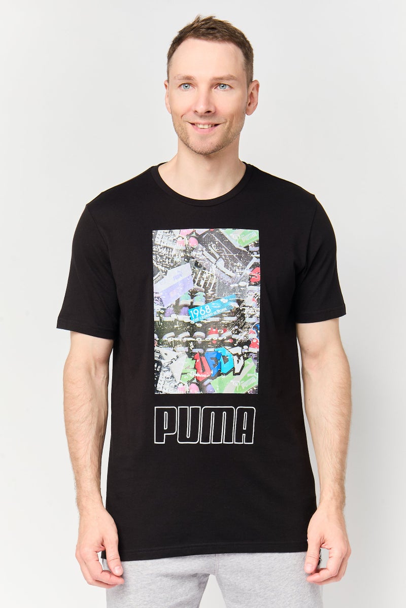 PUMA Men Sportswear Fit Short Sleeve Outdoor T-Shirt, Black - Image 1