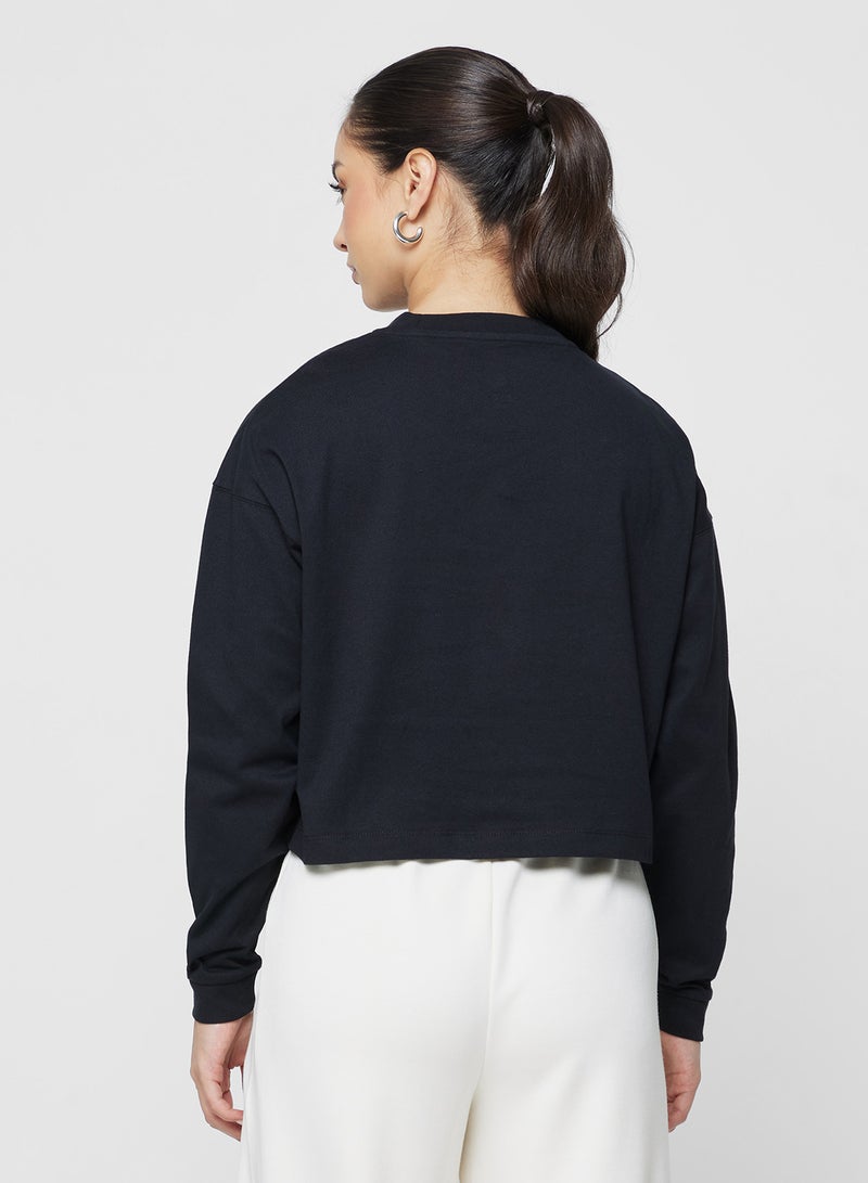 بلوزة قصيرة عصرية بجيب