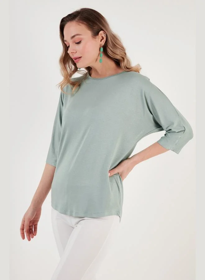 ليلا بلوزة نسائية ليلا بأكمام ترافكار وياقة دائرية