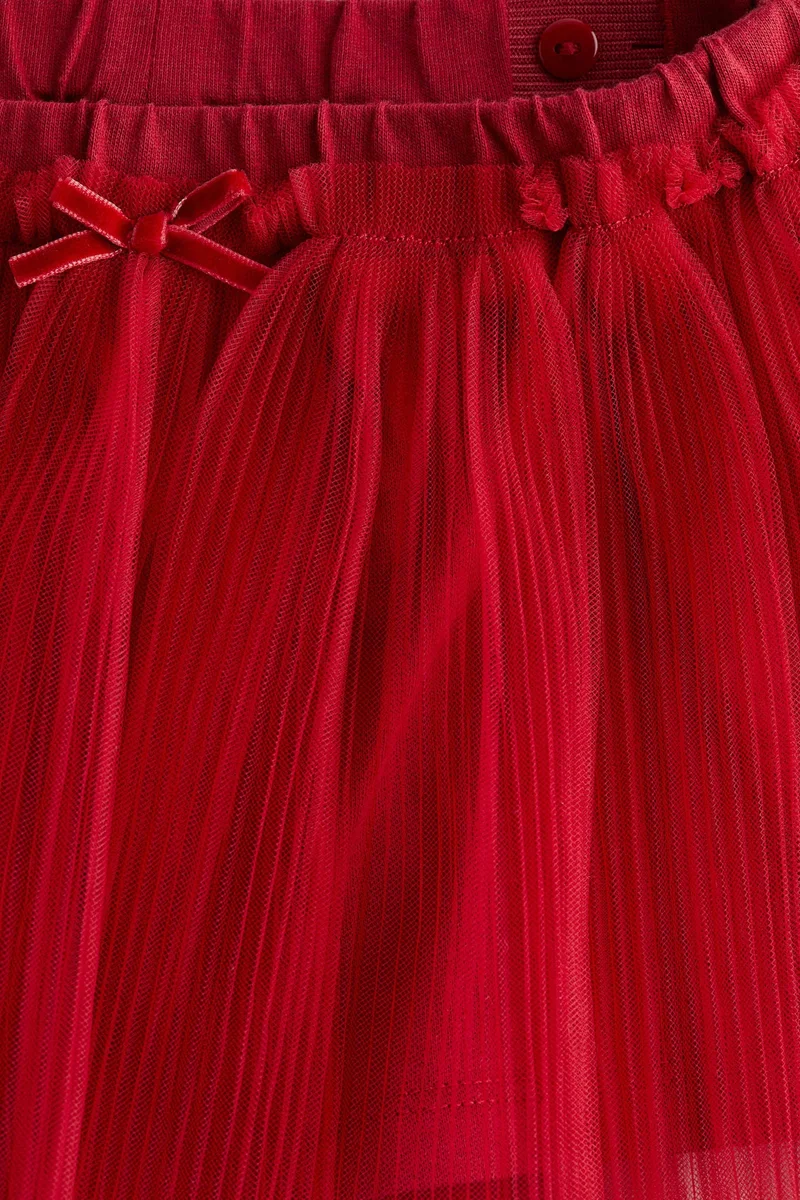 اتش اند ام تنورة من قماش التول البليسيه