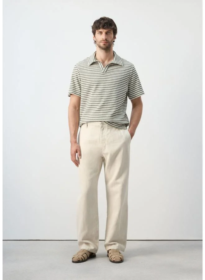 Mango Man  Regular fit textured stripe polo for Men | Best Price UAE