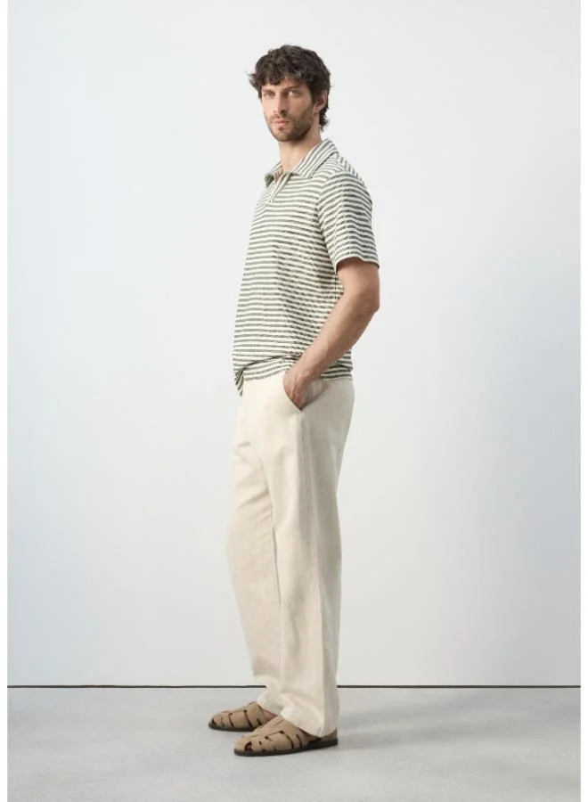 Mango Man  Regular fit textured stripe polo for Men | Best Price UAE