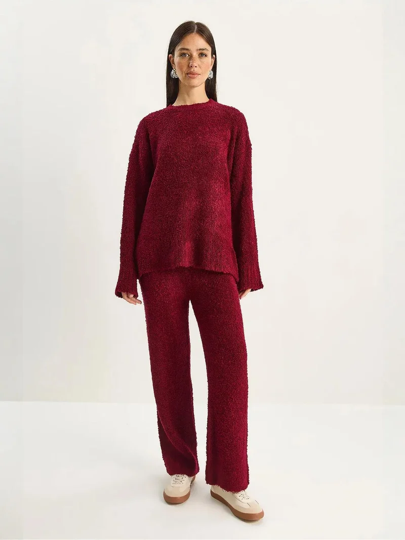 بيانكو لوتشي طقم قطعتين محبوك كبير الحجم من لوتشي