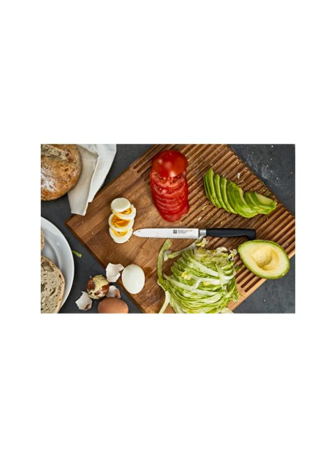 Zwilling Four Star Utility Knife 13cm. Ergonomic handle. Forged Special Formula High-Carbon stainless steel. Ice-hardened. Precision-honed. 57 Rockwell Hardness. 15 degrees edge angle. Made in Germany  - Image 2