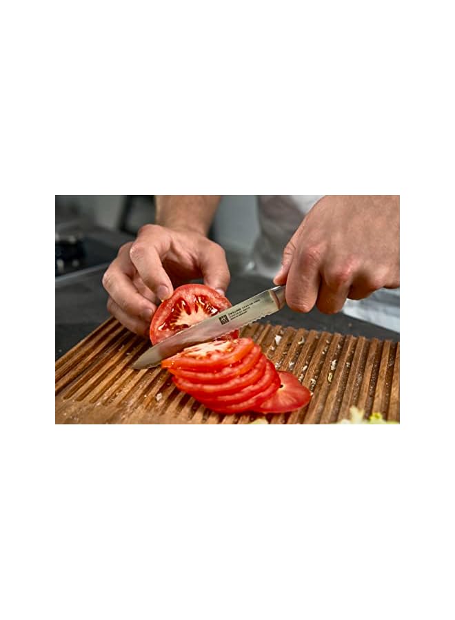 Zwilling Four Star Utility Knife 13cm. Ergonomic handle. Forged Special Formula High-Carbon stainless steel. Ice-hardened. Precision-honed. 57 Rockwell Hardness. 15 degrees edge angle. Made in Germany  - Image 3