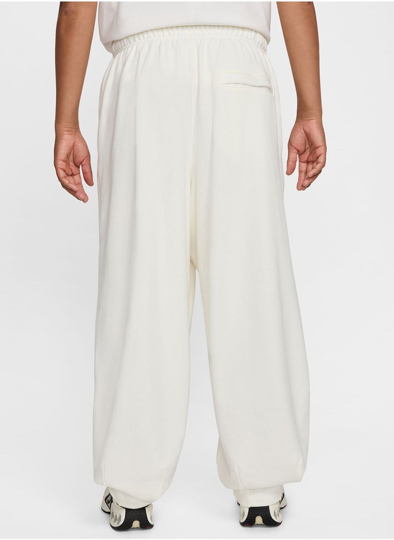Nike - Club Fitted Oversized Sweatpants - Image 1